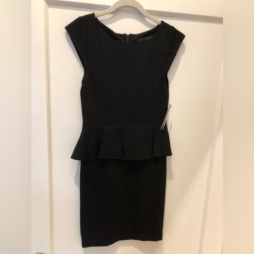 Alice + Olivia black peplum dress. NWT size 6